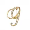 Temperamento de comercio exterior europeo y americano 26 broches de letras inglesas femenina diamante personalidad Joker moda corsage pin masculino accesorios