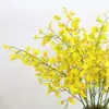 Simulación de dos pétalos amarillos orquídea danzante pequeña orquídea pequeña recubierta de pegamento material de arreglo floral de alta calidad arte floral de mesa ramo