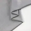 Tecido twill fino de 260g, adequado para o verão, liso, com trama twill misturada, usado para calças sociais e trajes profissionais, com textura semelhante à lã