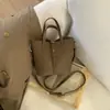 Bolso de mano de cubo estilo nuevo para invierno 2025, bolso cesta elegante de gran capacidad, bolso de hombro cruzado retro personalizado