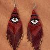 Cinco características, ojos, aretes, explosiones amazónicas, aretes de borla larga caliente transfronterizos europeos y americanos, aretes bohemios