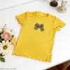 2026 Novo Conjunto de Duas Peças Verão Doce Saia Xadrez Elegante Versátil Blusa de Manga Curta Infantil e Saia Curta Floral