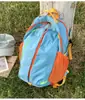 Mochila de senderismo y montañismo para exteriores de color dopamina a bloques, multifuncional, bolsa de viaje, bolsa para portátil, bolso de hombro