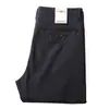 Pantalones casuales de lujo de alta gama para hombre otoño e invierno de papá sin planchado antiarrugas importados Tencel de negocios rectos de cintura media