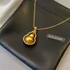 Colar de Cabaza Dourada Areias Antigas para Mulheres Outono e Inverno Nicho Versátil Corrente de Colar com Pingente Vazado Folu de Alta Qualidade Joia