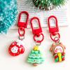 Llavero navideño de dibujos animados para estudiantes, bonita mochila decorativa de resina, colgante de Papá Noel, pequeños regalos