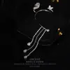 Estilo Douyin Mismo Estilo Mariposa Flor Colgante de Oreja Sin Agujeros en las Orejas Pinza para Oreja Mujer Lujo Ligero Elegante Versátil Espiga Borla Pendientes