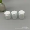 Producido 20 Dientes 20/415 Plástico Brillante Tapa Qianqiu Blanca Botella Blanca para Loción Champú Leche de Ducha Presión Superior Plana