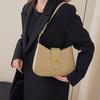 Nova bolsa de bolinho de design sofisticado de nicho para outono e inverno, bolsa de ombro para deslocamento, bolsa de axila, pequena bolsa estilo Chanel, bolsa feminina baguette