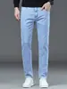 Fotos reales de jeans gruesos, elásticos, de corte ajustado, pierna recta para hombre para otoño e invierno, un pantalón largo casual moderno y versátil para hombres jóvenes
