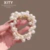 Novos elásticos de cabelo com pérolas estilo coreano e japonês para mulheres, luxo leve e sensação de alta qualidade, versáteis para coques e rabos de cavalo, acessórios de cabelo da moda