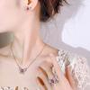 Otoño e invierno nueva joyería traje de joyería moda aretes de mariposa collar anillo rubí natural para mujer productos dulces