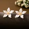 Brincos de Flor com Gotejamento de Óleo, Tendência de Moda de Venda Quente Transfronteiriça, Nicho, Adequados para Mulheres Usarem em Encontros Diários e Férias na Praia