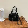 Bolso de mano coreano de nicho moderno con remaches para mujer, nuevo de otoño, retro, dulce, fresco, chica popular, bolso de hombro cruzado versátil