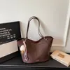 Bolso de Gamuza de Gran Capacidad para Mujer 2026 Nueva Moda Retro para el Trabajo y el Viaje Diario Bolso Tote Elegante de Hombro Único