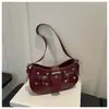 Bolso de Axila de Nicho Transfronterizo para Mujer Modelo Nuevo 2026 Bolso de Hombro Texturizado de Alta Calidad con Tachuelas Estilo Dulce-Cool Versátil Bolso Cruzado
