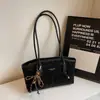 Bolso tote nuevo de moda muy elegante de gran capacidad, bolso versátil para exteriores y para ir al trabajo para mujer, bolso de hombro y debajo del brazo con estampado de leopardo de moda