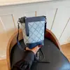 Shuai Mijia Estilo Coreano Moderno Bolso Pequeño Mujer 2026 Nueva Moda Bolso Cubo Cuadros de Diamante Nicho Simple Bolso Cruzado para Teléfono