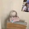 Moda de Primavera 2026 Transfronteriza Bolso de Mano de Oficina Exquisito y Moderno Bolso de Hombro para Mujer Bolso Cruzado Versátil