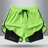 Venta al por mayor del fabricante Exportación transfronteriza Pantalones cortos de seda helada para hombre Verano Tres puntos Pantalones deportivos de playa Secado rápido Correr Fitness Entrenamiento