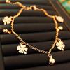 Pulsera de Acero de Titanio Tobillera con Cascabel de Trébol de Cuatro Hojas para Mujer, Estilo Antiguo Ins Diseño de Nicho Popular No se Desvanece Tobillo