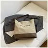 Bolso Casual de Gran Capacidad para Mujer 2025 Nuevo Popular Versátil Bolso de Hombro de Lona Estilo Popular de Celebridad de Internet Bolso Cruzado Tipo Cubo