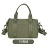 Mochila Pequena Bolsa de Maquiagem 2026 Novo Modelo Bolsa Boston Simples Versátil Bolsa de Ombro Transversal Bolsa de Mão Urbana