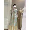 Estilo fresco y elegante con tapeta diagonal abotonada, vestido de té de verano vintage de longitud media para mujer con abertura lateral, conjunto de dos piezas