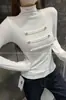 Camiseta de punto negra de manga larga ajustada para mujer, estilo retro americano, moderna, de cuello alto, con botones, colección de otoño 2026
