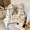 Cárdigan de punto a rayas para mujer estilo coreano, transfronterizo, nuevo para otoño e invierno 2026, cuello en V, corte holgado, adelgazante, manga larga