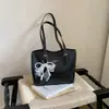 2026 Nuevo Bolso Tote de Diseño Nicho Estilo Coreano Bolso de Hombro de Gran Capacidad Bolsa Simple de Moda para Viajar Caricatura