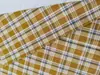 Suministro directo de fábrica en stock tela clásica de hilo de algodón teñido en hilo Camisa Cuadros Ropa para niños Falda para mujer Pantalones
