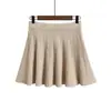 Falda corta de punto de lana blanca para mujer, nuevo estilo otoño e invierno, de cintura alta, línea A adelgazante, plisada, para mujeres petite