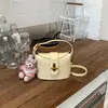 Bolso de mano estilo extranjero, bolso tipo cubo para mujer, nuevo modelo 2026 de moda, versátil bolso de hombro y cruzado, pequeño bolso tote para salir
