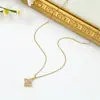 Moda Nuevo Collar de Flor de Cuatro Hojas para Mujer 2025 Verano Cadena de Acero de Titanio Ins Europeo y Americano Que No Se Desvanece Venta Directa de Fábrica
