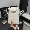 Bolso de mujer transfronterizo 2026 nuevo primavera-verano, de alta gama, moderno, ultra popular, exquisito, de moda, bandolera y cruzado tipo cubo