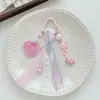 Colgante de bolsa de cinta de encaje rosa dulce con forma de corazón estilo coreano con llavero de oso y lazo lindos para mochilas de niñas