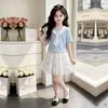 Conjunto de dos piezas de estilo universitario para niñas de verano con corbata, top de manga corta, falda corta fresca y falda con adorno de encaje dulce