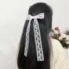 Horquilla de lazo con flores de encaje para mujer, horquilla para la parte posterior de la cabeza con temperamento francés, sencilla, combina con todo, joyería para el cabello rojo de red