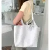 Bolso de hombro de alta gama con estampado de estrellas estilo coreano para mujer, bolso tote de gran capacidad para el día a día, estilo casual, adecuado para la escuela, bolso de mano de lona a la moda