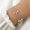 Pulsera de cadena de perlas de imitación de venta caliente transfronteriza para mujer, moda simple Joker, 4 mm, joyería de mano de perlas artificiales al por mayor