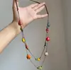 Collar de cuentas de corazón colorido estilo étnico para mujer, diseño de nicho, estilo largo con sensación de alta gama, cadena para la clavícula de doble capa de cuerda trenzada marrón