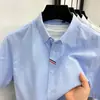 Camisa de Lino para Hombre 2026 Verano Nueva Moda Casual Simple Color Sólido Cuello Camisero Camisa de Manga Corta para Hombre Venta al por Mayor