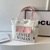 Bolsa Tote de Nicho da Moda Atacado Transfronteiriça Grande Capacidade Casual de Viagem Bolsa de Ombro Cor Contrastante Portátil de Lona Bolsa de Axila
