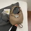 Bolso de mano pequeño de moda con estampado de lichi transfronterizo para mujer, nueva colección 2026, bolso tote para el trabajo, bolso tipo cubo, bolso cruzado moderno y elegante