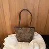 Bolso de Mano Estampado de Leopardo para Mujer Gran Capacidad 2026 Nuevo Otoño Invierno Nicho Vintage Bolso de Hombro Único Bolso Cubo para el Trabajo y el Trayecto