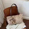 Bolsa Tote Suede Bolinhas Retro Feminina Outono/Inverno 2026 Nova Grande Capacidade Simples de Ombro e Mão para o Dia a Dia