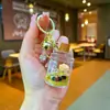 Nuevo llavero de bubble tea oso de leche pequeño flotante botella de arena movediza líquida adorno colgante de regalo para pareja bolsa de regalo adornos colgantes para mujer
