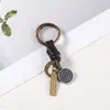 Nuevo cierre de resorte tejido a mano retro versátil llavero de piel de vaca accesorios de colgante semiacabados para DIY