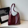 Bolsa Feminina de Grande Capacidade 2026 Nova Vintage Simples para o Dia a Dia Bolsa Tote Nicho Versátil Bolsa de Ombro